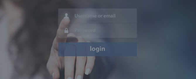 A woman entering her username and password.